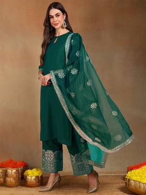 Women teal silk blend solid straight festive kurta palazzos with dupatta 3
