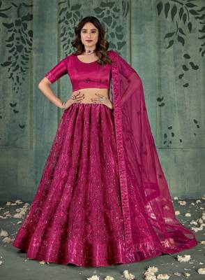 MAGENTA PINK SEQUINS THREAD EMBROIDERED SOFT NET SEMI STITCHED LEHENGA CHOLI 1