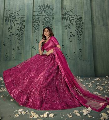 MAGENTA PINK SEQUINS THREAD EMBROIDERED SOFT NET SEMI STITCHED LEHENGA CHOLI 3