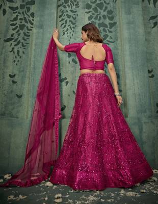 MAGENTA PINK SEQUINS THREAD EMBROIDERED SOFT NET SEMI STITCHED LEHENGA CHOLI 6