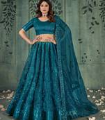 TURQUOISE SEQUINS THREAD EMBROIDERED SOFT NET SEMI STITCHED LEHENGA CHOLI