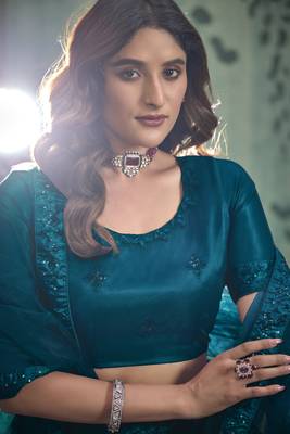 TURQUOISE SEQUINS THREAD EMBROIDERED SOFT NET SEMI STITCHED LEHENGA CHOLI 3