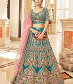 TURQUOISE THREAD ZARI DORI AND SEQUINS EMBROIDEREY WORK VELVET SEMI STITCHED LEHENGA CHOLI
