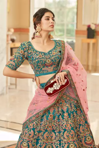 TURQUOISE THREAD ZARI DORI AND SEQUINS EMBROIDEREY WORK VELVET SEMI STITCHED LEHENGA CHOLI