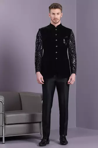 Black velvet jodhpuri suit with floral sequins work on sleeves