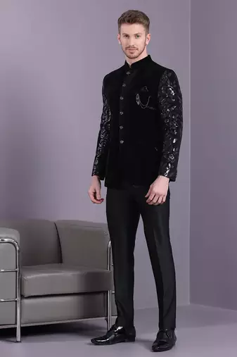 Black velvet jodhpuri suit with floral sequins work on sleeves