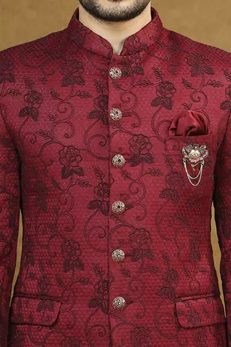 Red jacquard jodhpuri suit with floral dori work