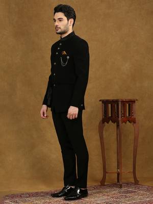 solid black jodhpuri suit with collar placement and tieable waist belt 3