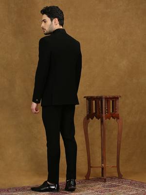 solid black jodhpuri suit with collar placement and tieable waist belt 4