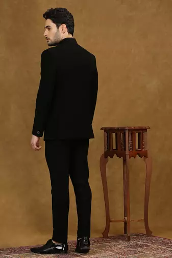 solid black jodhpuri suit with collar placement and tieable waist belt