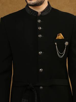 solid black jodhpuri suit with collar placement and tieable waist belt 5