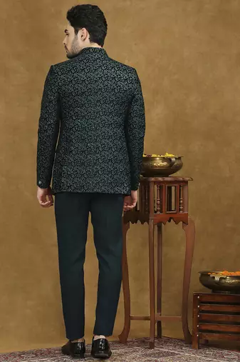 Rama green velvet jodhpuri suit with floral thread weave and sequins work