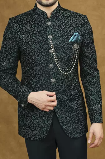 Rama green velvet jodhpuri suit with floral thread weave and sequins work