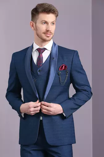 Blue self design suit with same fabric waistcoat