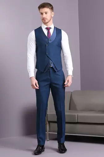 Blue self design suit with same fabric waistcoat