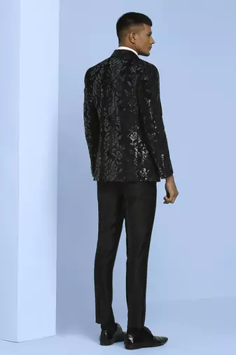 Black velvet suit with floral sequins work