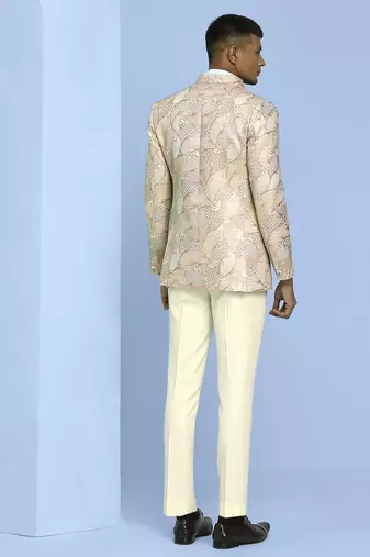 Cream high neck suit with golden thread weave ethnic motif jacquard