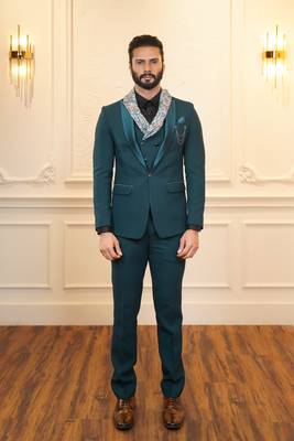 Peacock green suit with scarf attached waistcoats 1