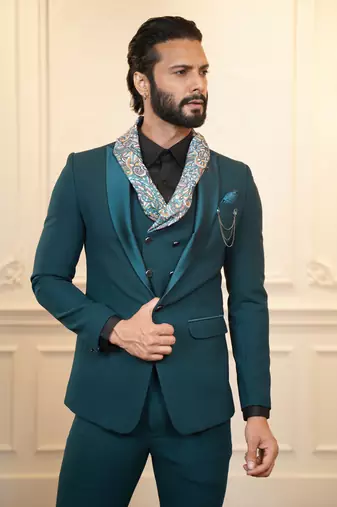 Peacock green suit with scarf attached waistcoats