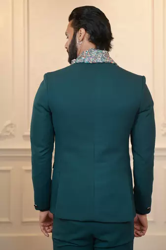 Peacock green suit with scarf attached waistcoats