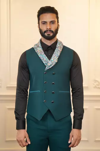 Peacock green suit with scarf attached waistcoats