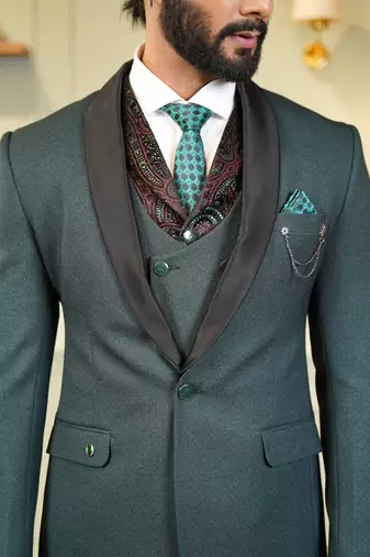 Green tuxedo with black detachable lapel and dual waistcoats