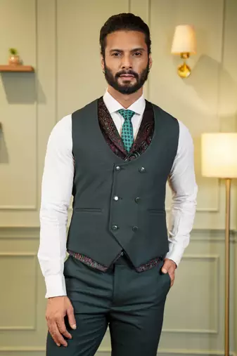 Green tuxedo with black detachable lapel and dual waistcoats