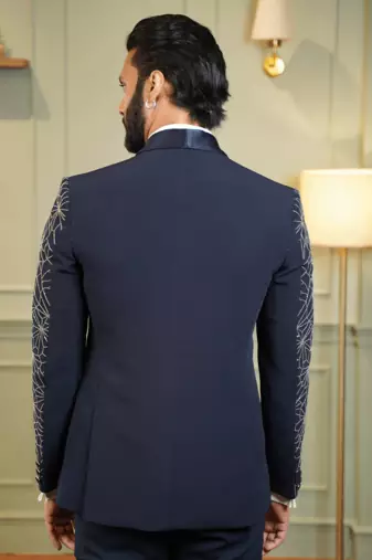 Navy blue suit with golden spider web embroidery