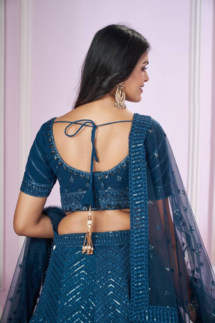 BLUE SEQUINS THREAD EMBROIDERED GEORGETTE SEMI STITCHED LEHENGA CHOLI