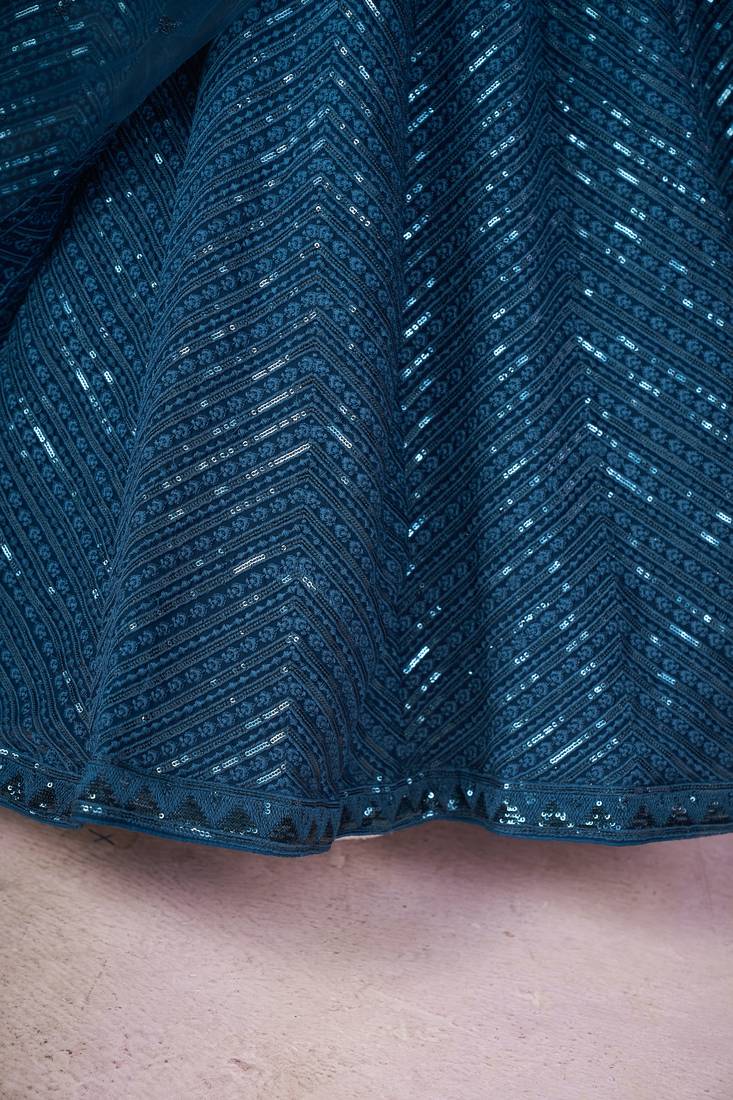 BLUE SEQUINS THREAD EMBROIDERED GEORGETTE SEMI STITCHED LEHENGA CHOLI