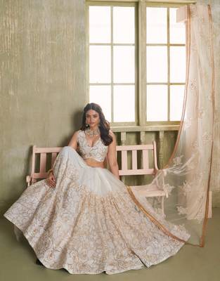 OFF WHITE NET FABRIC LAHENGA CHOLI WITH SEQUINS AND THREAD EMBROIDERY WORK 4