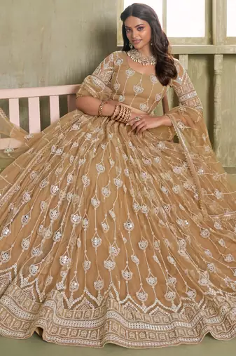 BEIGE NET FABRIC LAHENGA CHOLI WITH SEQUINS AND THREAD EMBROIDERY WORK