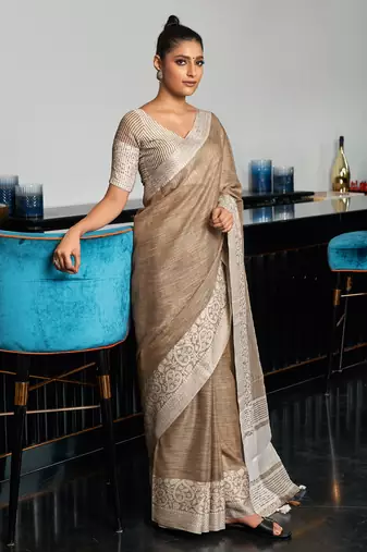 beige linen woven work traditional tassle saree