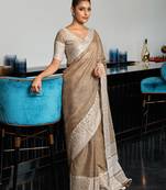beige linen woven work traditional tassle saree