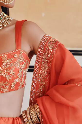 BROAD STEP EMBROIDERED BLOUSE WITH BUTTI EMBROIDERED LEHENGA AND DUPATTA