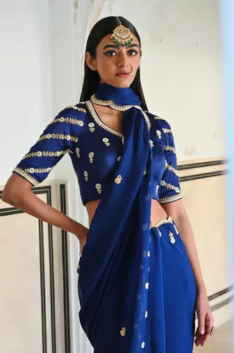 Royal blue scallop embroidered saree with raglan sleeve blouse