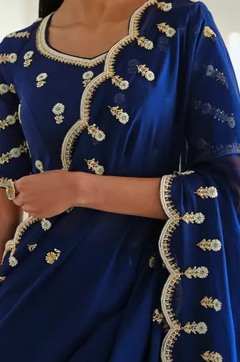 Royal blue scallop embroidered saree with raglan sleeve blouse