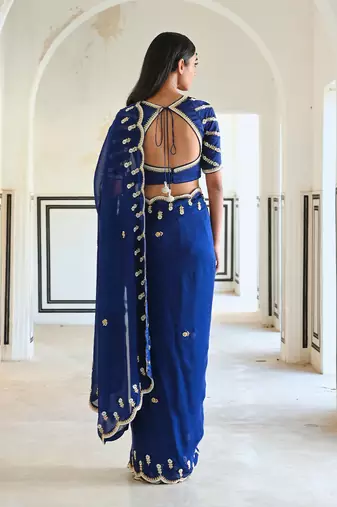 Royal blue scallop embroidered saree with raglan sleeve blouse