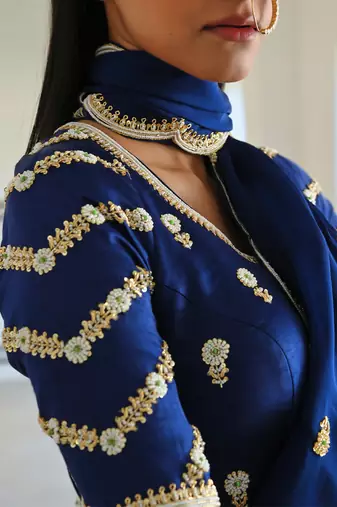 Royal blue scallop embroidered saree with raglan sleeve blouse
