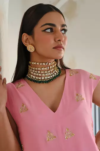 Baby pink small floral butti embroidered loose jumpsuit.