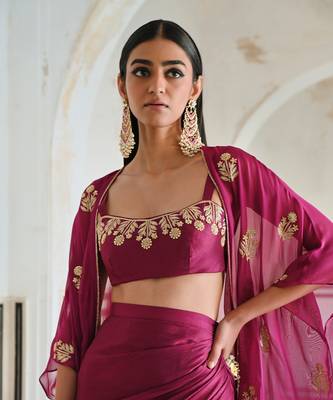 Magenta floral embroidered neckline bralet with floral butti embroidered jacket and cowl skirt. 2