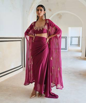 Magenta floral embroidered neckline bralet with floral butti embroidered jacket and cowl skirt. 4