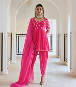 Rose pink raglan sleeve butti embroidered peplum with dhoti and dupatta.