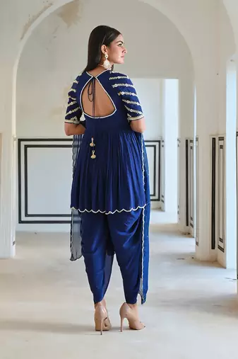 Royal blue raglan sleeve butti embroidered peplum with dhoti and dupatta.