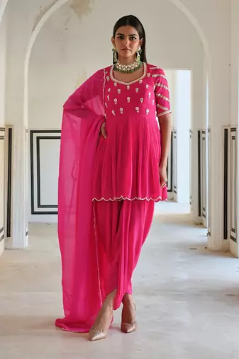 Rose pink raglan sleeve butti embroidered peplum with dhoti and dupatta.