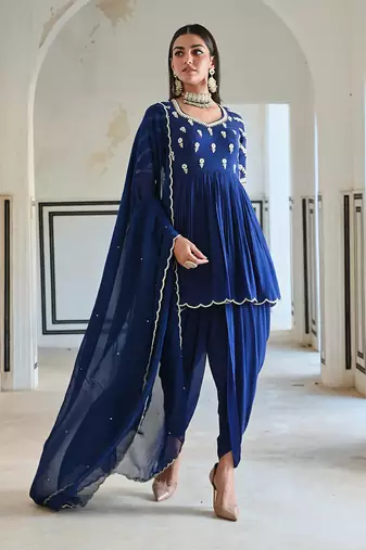 Royal blue raglan sleeve butti embroidered peplum with dhoti and dupatta.