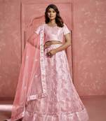 PEACH SEQUINS THREAD EMBROIDERED SOFT NET SEMI STITCHED LEHENGA CHOLI