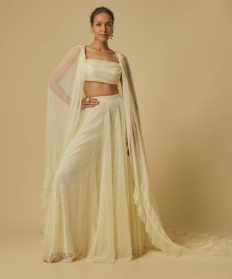 Yellow heavy embroidered gharara with blouse and ruffle cape 1