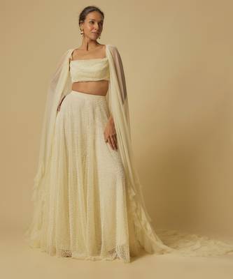 Yellow heavy embroidered gharara with blouse and ruffle cape 2