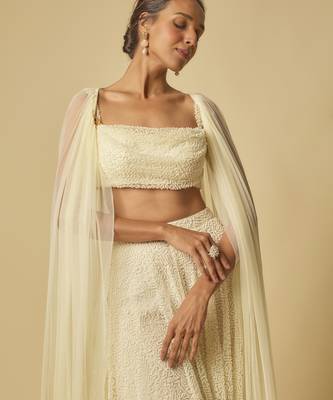 Yellow heavy embroidered gharara with blouse and ruffle cape 3